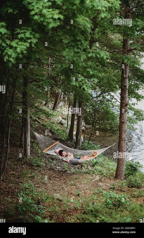 Person Laying In Hammock Hi Res Stock Photography And Images Alamy