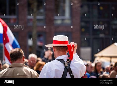 Traditional Dutch Carrier Clothes At Alkmaar Cheese Market Stock Photo