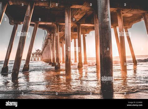 Under The Huntington Beach Pier California At Sunset Stock Photo Alamy