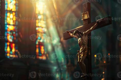 Crucifix Jesus On The Cross In Church With Ray Of Light From Stained