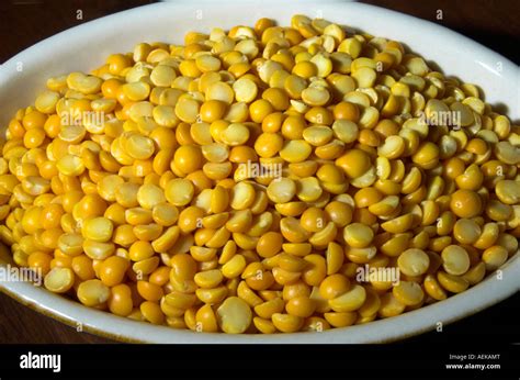 Dried Yellow Split Peas In A Dish Stock Photo Alamy