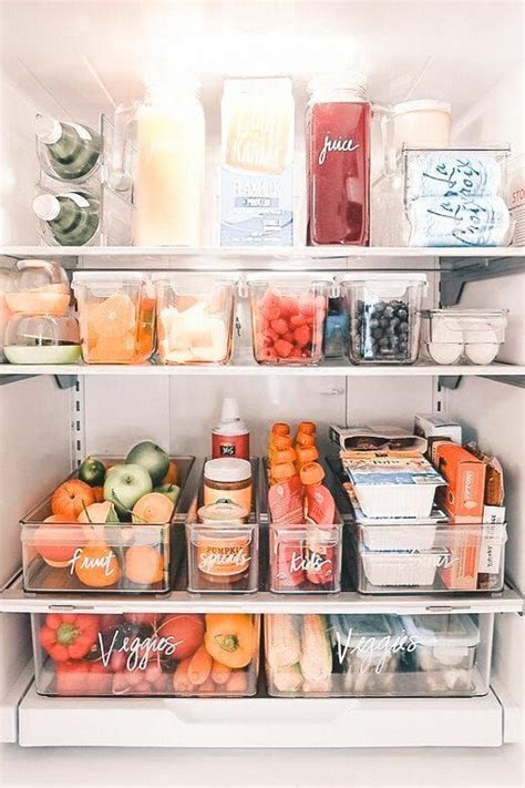 An Open Refrigerator Filled With Lots Of Different Types Of Fruits And