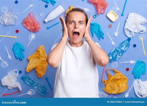 Photo Of Despair Unhappy Woman Picked Plastic Litter Isolated On Blue