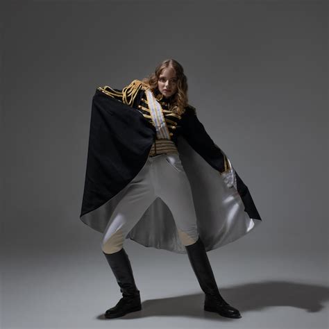 Premium Photo A Glamorous Blonde In A Carnival Uniform With Epaulettes Posing With Pretentious