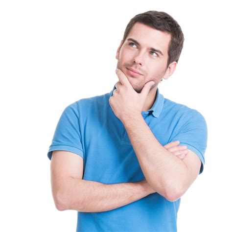 Free Photo Portrait Of The Young Thinking Man Looks Up With Hand Near