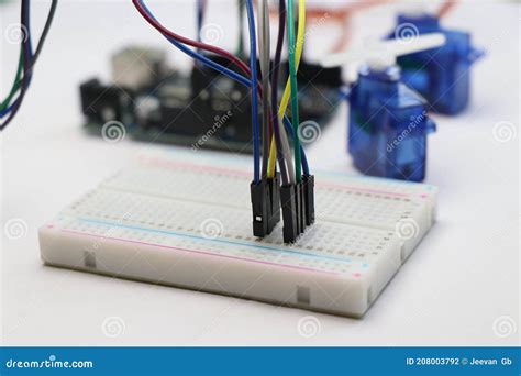 Breadboard with Jumper Wires Connected Along with Arduino Uno and Micro Servo on Background ...