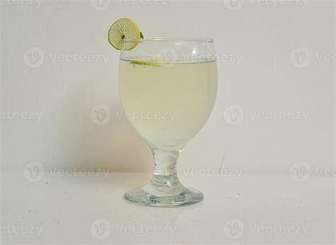 Fresh Lime Water Lemo Pani With Lemon Slice Served In A Glass Isolated