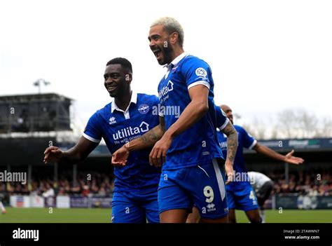 Eastleigh's Paul McCallum (right) celebrates scoring the opening goal ...