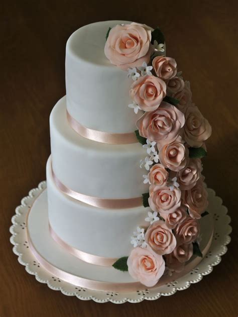 Peach Rose Cascade A Three Tier Birthday Cake With Sugarpaste Roses