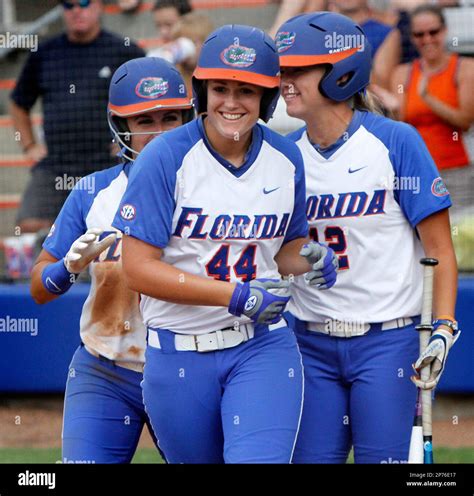 Floridas Brittany Schutte 44 Celebrates With Teammates At Home Plate