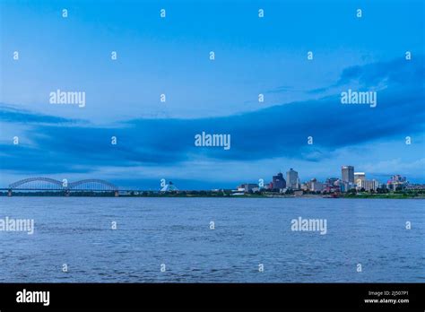 The Hernando De Soto Bridge And Memphis Skyline Seen At Dusk From The