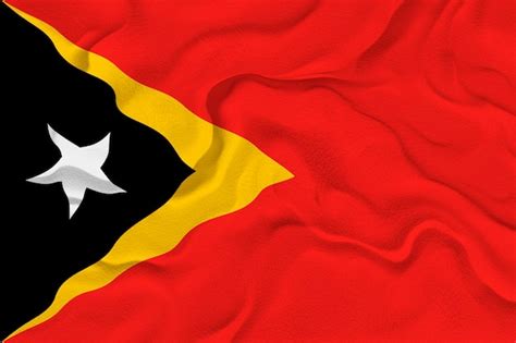 Premium Photo | National flag of East Timor Background with flag o of ...