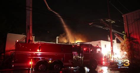 Firefighters Battle Rekindled Flames At Warehouse Fire In Delaware