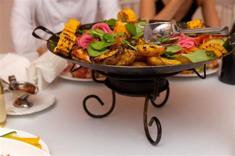 Premium Photo | Assorted meat and vegetables fried in a wok