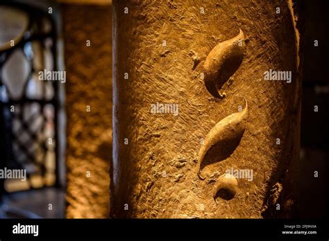 Shapes Of Leaves Sculpted On A Stone Column On The Access Staircase To