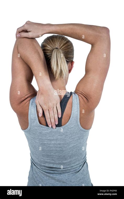 Rear View Of Muscular Woman Stretching Her Arm Stock Photo Alamy