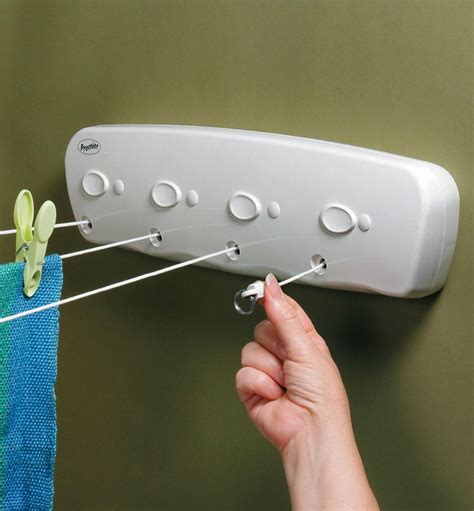 Retractable Indoor Clotheslines | Laundry room drying rack, Laundry room design, Laundry room diy