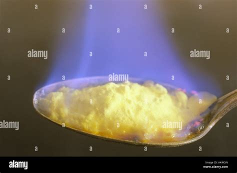 Burning Sulfur to Create Sulfur Dioxide Gas Stock Photo - Alamy