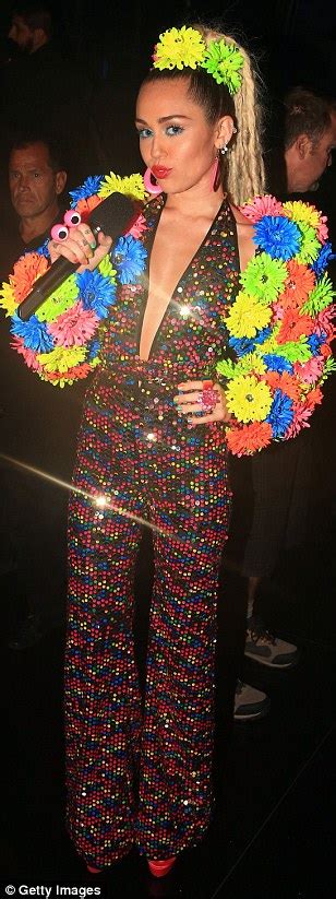 MTV VMAs Hostess Miley Cyrus Causes A Stir With 11 Eyebrow Raising