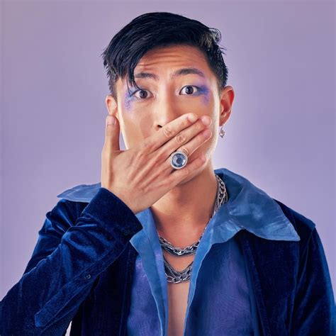 Premium Photo Surprised Shocked And Gay Man With Makeup In A Studio