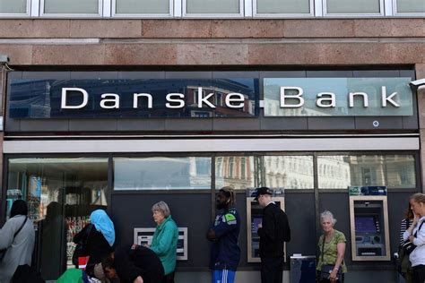 Danske Bank Hikes Guidance Resumes Dividends Reuters