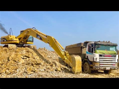 Excellent Working Excavator Caterpillar Loading To SCANA HiNO HYUNDAI