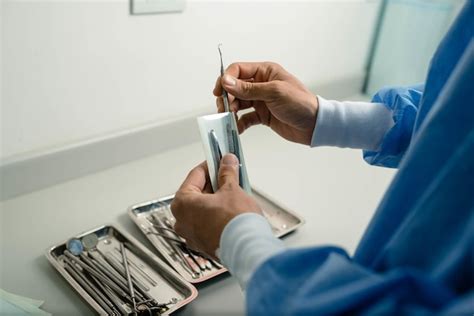 Premium Photo Top View Shot Of Dentist Opening The Dental Instruments
