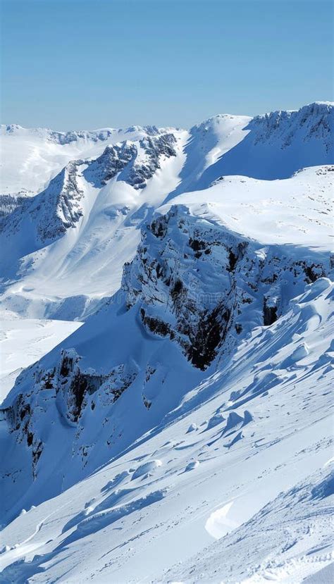 Alaskan Mountain Range Wilderness Landscape With Snow Covered Peaks In