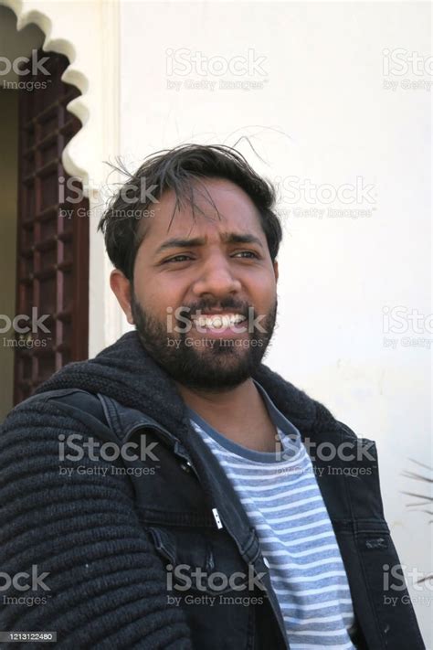 Image Of Young Handsome Indian Man Being Silly And Laughing Happy Hindu