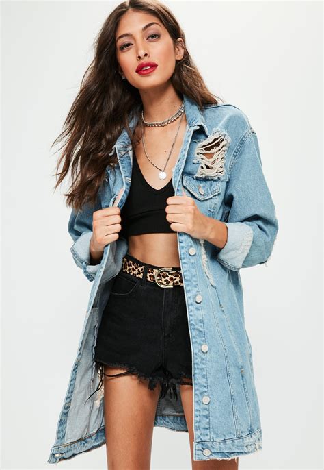 Lyst Missguided Blue Ripped Longer Length Denim Jacket In Blue