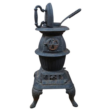 Antique Cast Iron Wood Burning Pot Belly Stove Railroad Sad Iron Stove Hook For Sale At 1stdibs