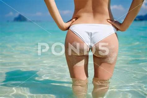 Photograph Sexy Sandy Woman Buttocks In White Bikini On The Beach Background