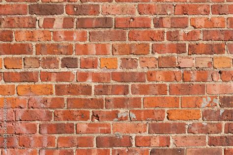 Antique Exterior Red Clay Brick Wall Background With Severely Decaying