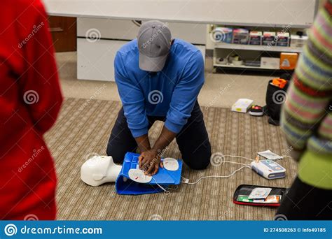 Cpr Training Class By Security Guard In Office Stock Image Image Of