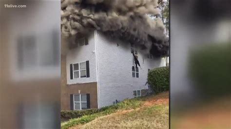 Hero Man Catches People Jumping From Burning Apartment In Dekalb Youtube