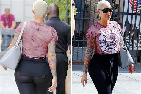 Amber Rose Flashes Her Peachy Bum As She Suffers Wardrobe Malfunction In Sheer Leggings During