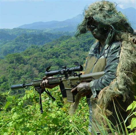 A Philippine Marine Scout Sniper Equipped With An Mssr Gen Standing