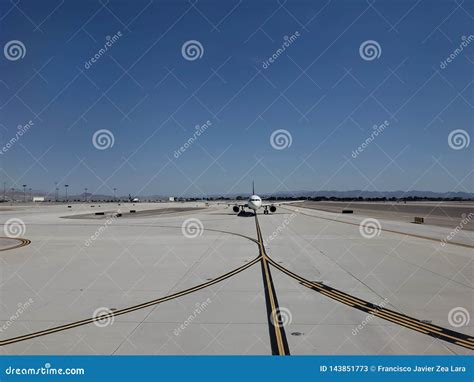 Plane On An Airstrip At An Airport Editorial Stock Photo Image Of