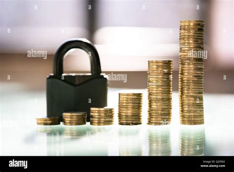 Salary Protection And Money Security. Coin Stack With Insurance Stock ...