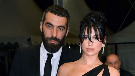 Dua Lipa makes red carpet debut with new beau Romain Gavras in sultry ...