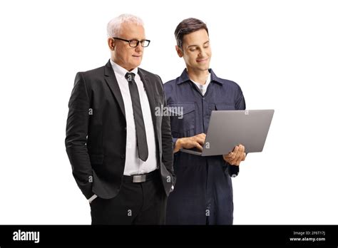 Mechanic And A Mature Businessman Looking At A Laptop Isolated On White
