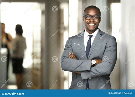 Handsome Cheerful African American Executive Business Man At The