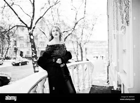 Elegance Blonde Girl In Red Evening Dress And Fur Coat At Streets Of
