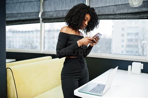 Fashionable Young Beautiful African American Business Woman With Afro