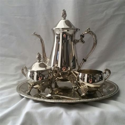 Silver plated coffee/tea set on a tray, 4-piece with floral - Catawiki