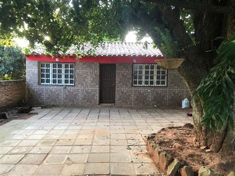 VENDO TERRENO CON CASA EN KOKUE GUASU AREGUA Ref N83CEA Infocasas