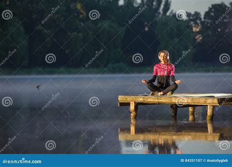 Woman Meditating In Nature On The River Yoga Stock Image Image Of