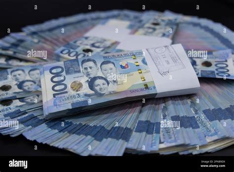 A Pile Of One Thousand Philippines Banknotes Cash Of Thousand Dollar