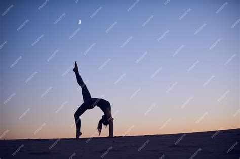 Premium Photo Beautiful Young Woman Practices Backbend Yoga Asana Eka