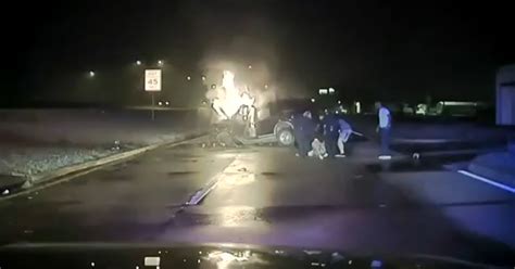 Watch Heroic Cops Good Samaritan Pull Man From Burning Car